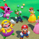 Mario and his chums, looking rather excited on a grassy background.